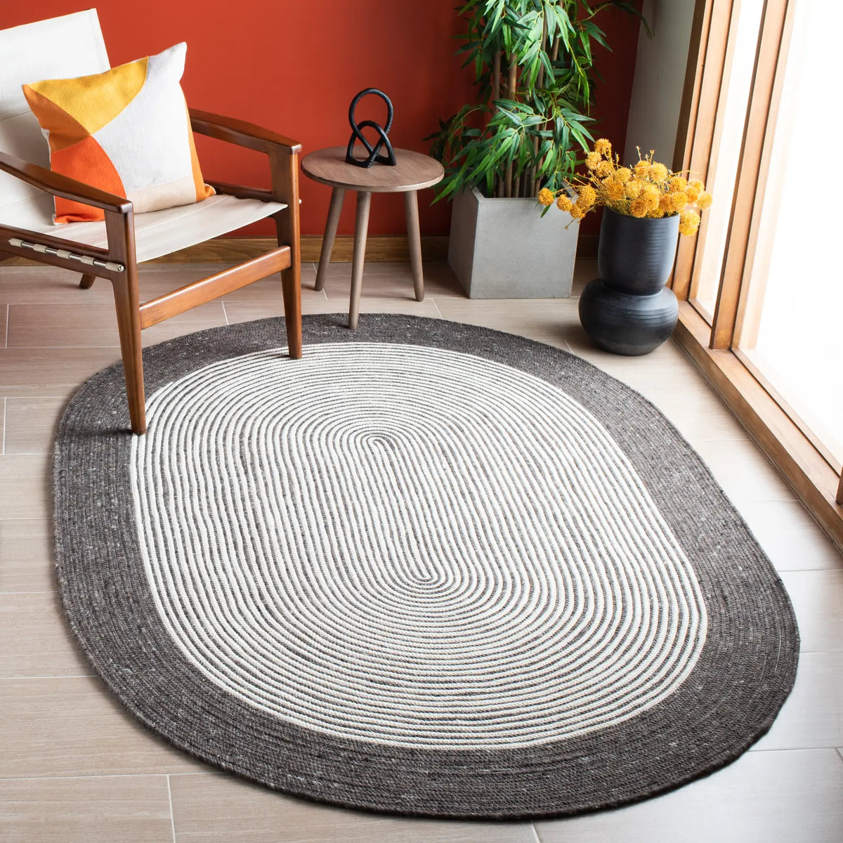 Safavieh Braided 5'-0" x 7'-0" Rug in Charcoal / Ivory