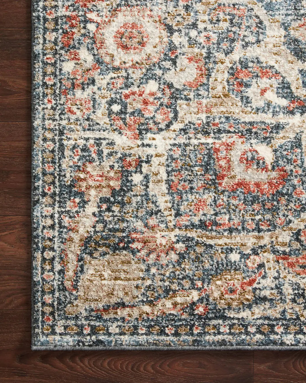 Loloi Saban Sab-02 Blue/Spice Rugs - corner on wood
