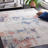 Safavieh Phoenix 500 4'-5" x 6'-5" Rug in Ivory / Blue Rust