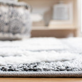 Safavieh Moroccan Tassel Shag 4'-0" x 6'-0" Rug in Grey / Ivory