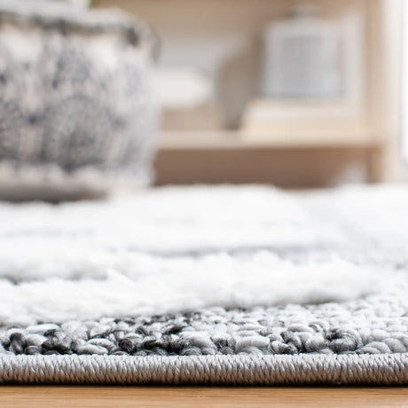 Safavieh Moroccan Tassel Shag 4'-0" x 6'-0" Rug in Grey / Ivory