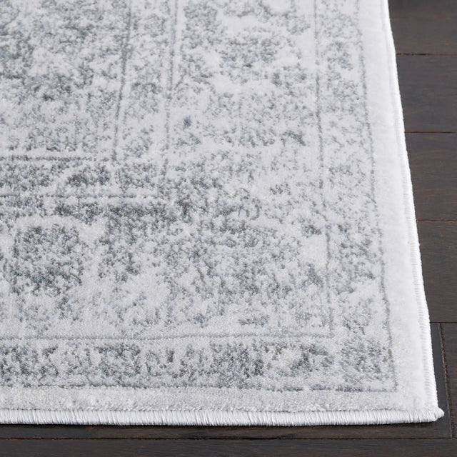Safavieh Carnegie 5'-1" x 7'-6" Rug in Cream / Dark Grey