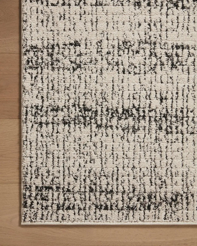 Loloi Darby Dar-02 Oatmeal/Charcoal Rug - corner on wood