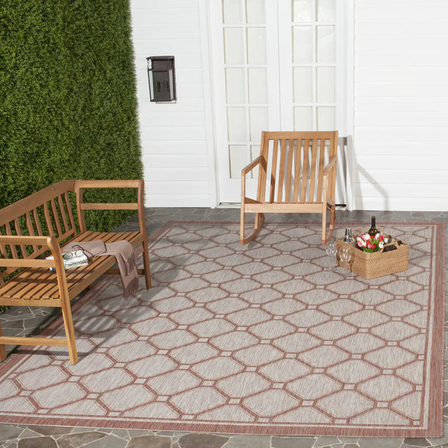 Safavieh Courtyard 6'-7" x 9'-6" Rug in Red / Beige
