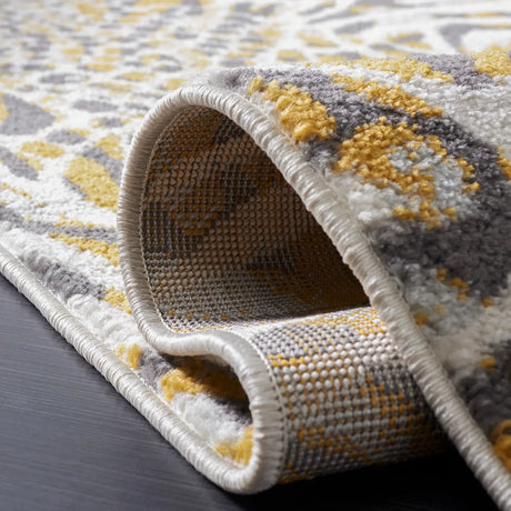 Safavieh Amsterdam 4'-0" x 6'-0" Rug in Beige / Gold