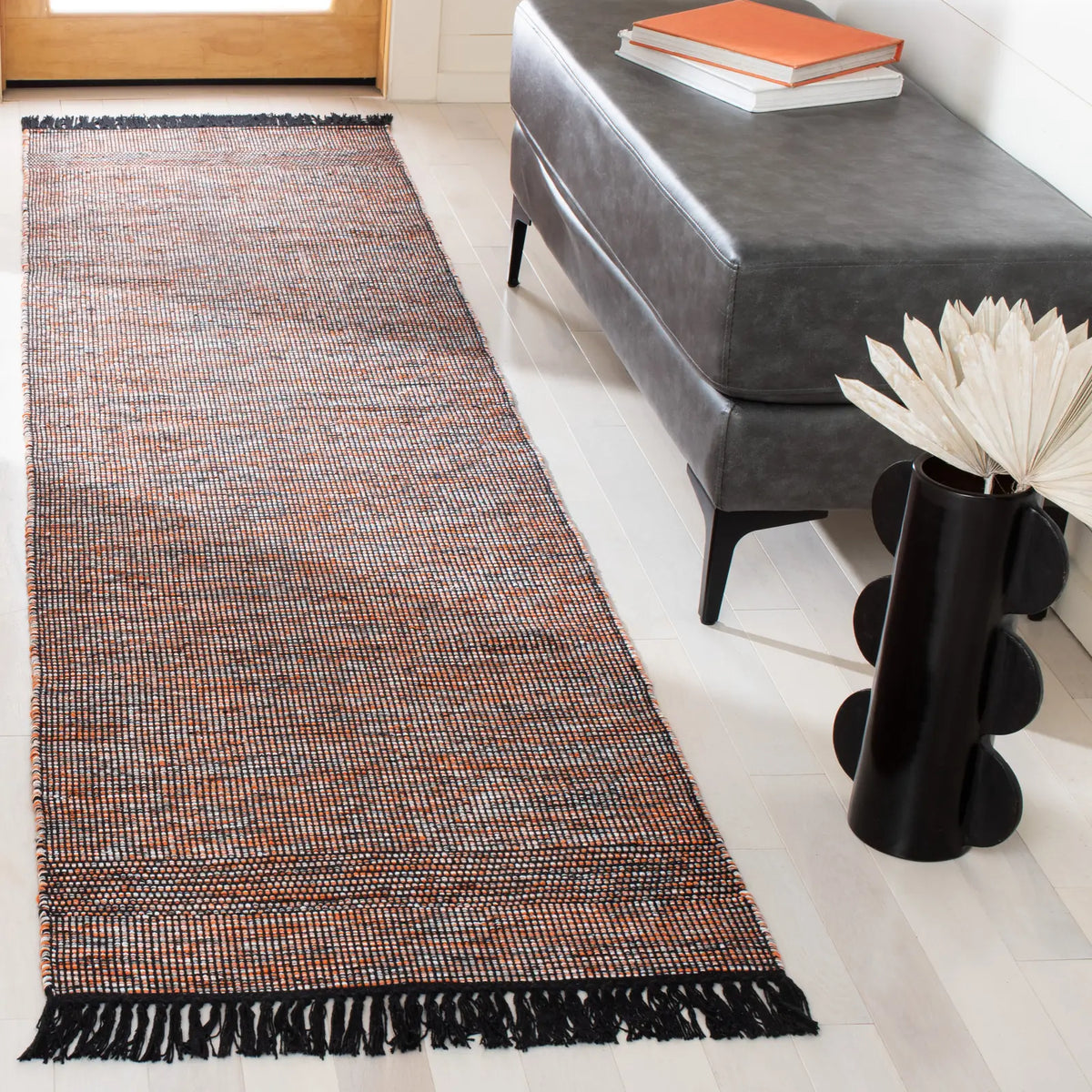 Safavieh Montauk 2'-3" x 9'-0" Rug in Orange / Black