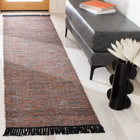 Safavieh Montauk 2'-3" x 9'-0" Rug in Orange / Black