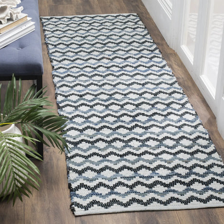 Safavieh Montauk 2'-3" x 10'-0" Rug in Ivory Blue / Black