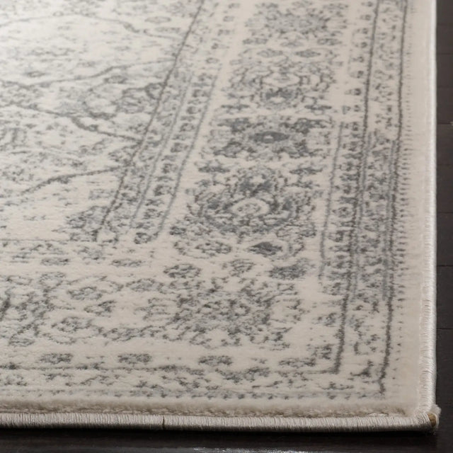 Safavieh Carnegie 5'-1" x 7'-6" Rug in Cream / Dark Grey
