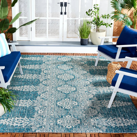 Safavieh Courtyard 6'-7" x 9'-6" Rug in Teal / Grey