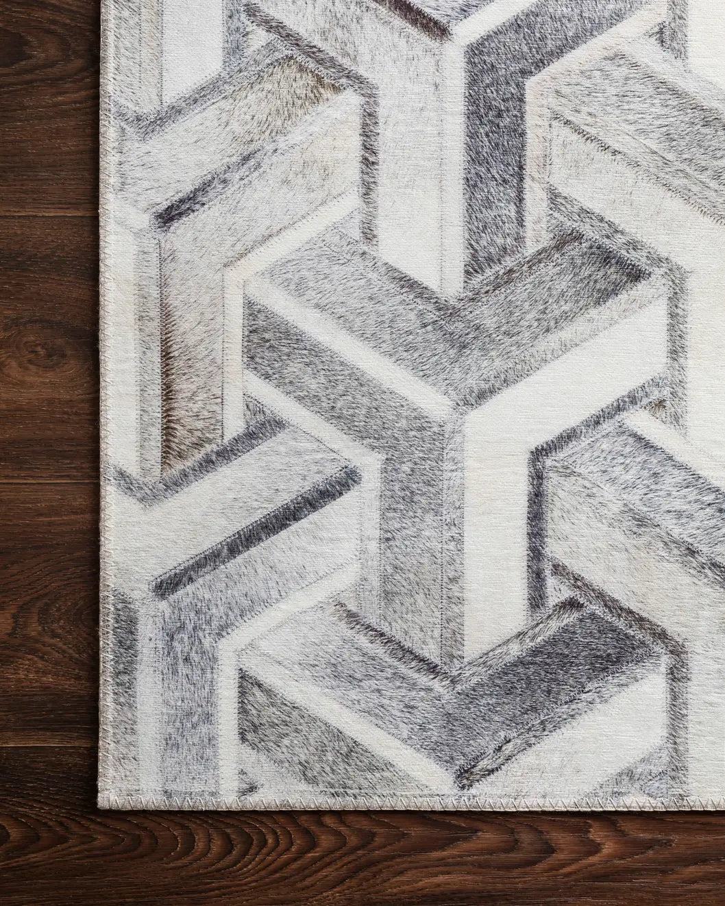 Loloi Maddox Mad-05 Silver / Ivory Rugs - corner on wood