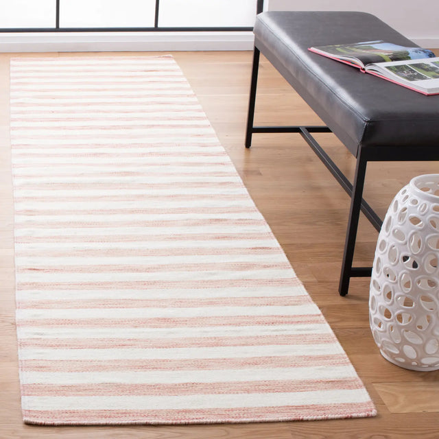 Safavieh Dhurries 2'-6" x 10'-0" Rug in Rust / Ivory