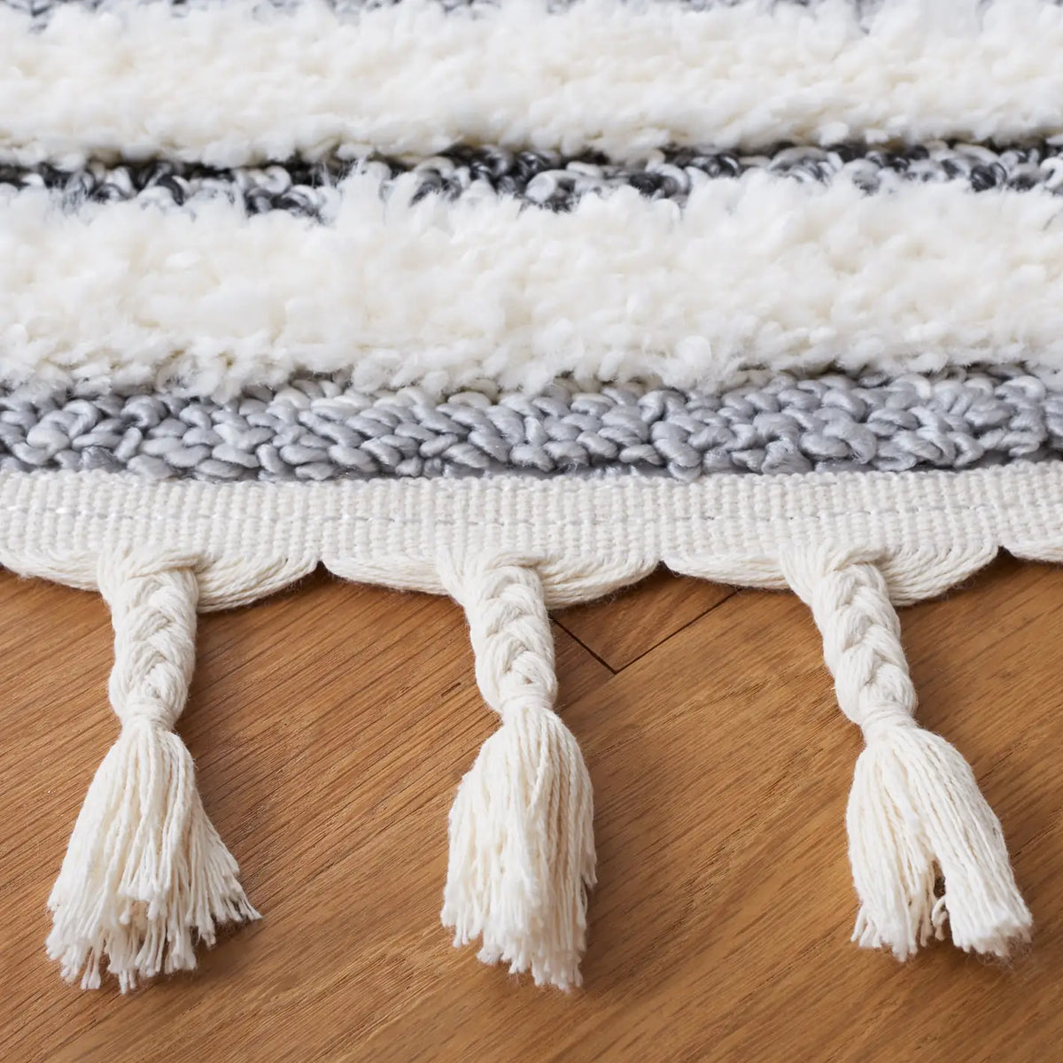 Safavieh Moroccan Tassel Shag 6'-7" x 6'-7" Rug in Dark Grey / Ivory