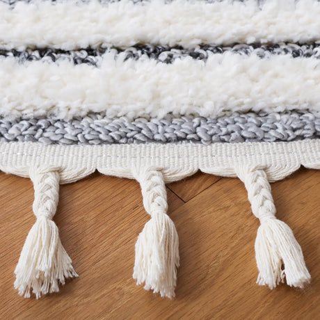 Safavieh Moroccan Tassel Shag 6'-7" x 6'-7" Rug in Dark Grey / Ivory