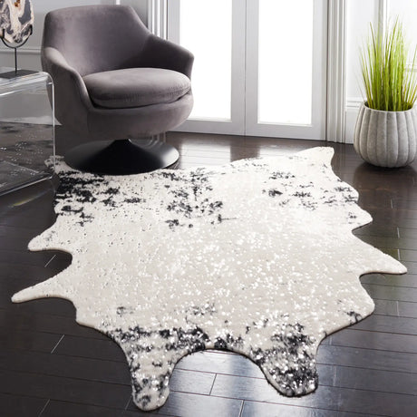Safavieh Faux Cowhide 5'-0" x 6'-5" Rug in Beige / Black