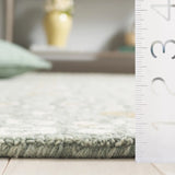 Safavieh Micro-Loop 4'-0" x 6'-0" Rug in Green / Ivory