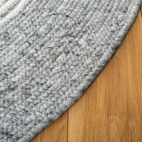 Safavieh Braided 5'-0" x 7'-0" Rug in Grey / Ivory