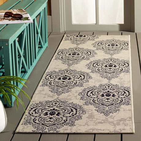 Safavieh Courtyard 2'-3" x 6'-7" Rug in Creme / Black