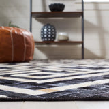 Safavieh Studio Leather 4'-0" x 6'-0" Rug in Black / Ivory