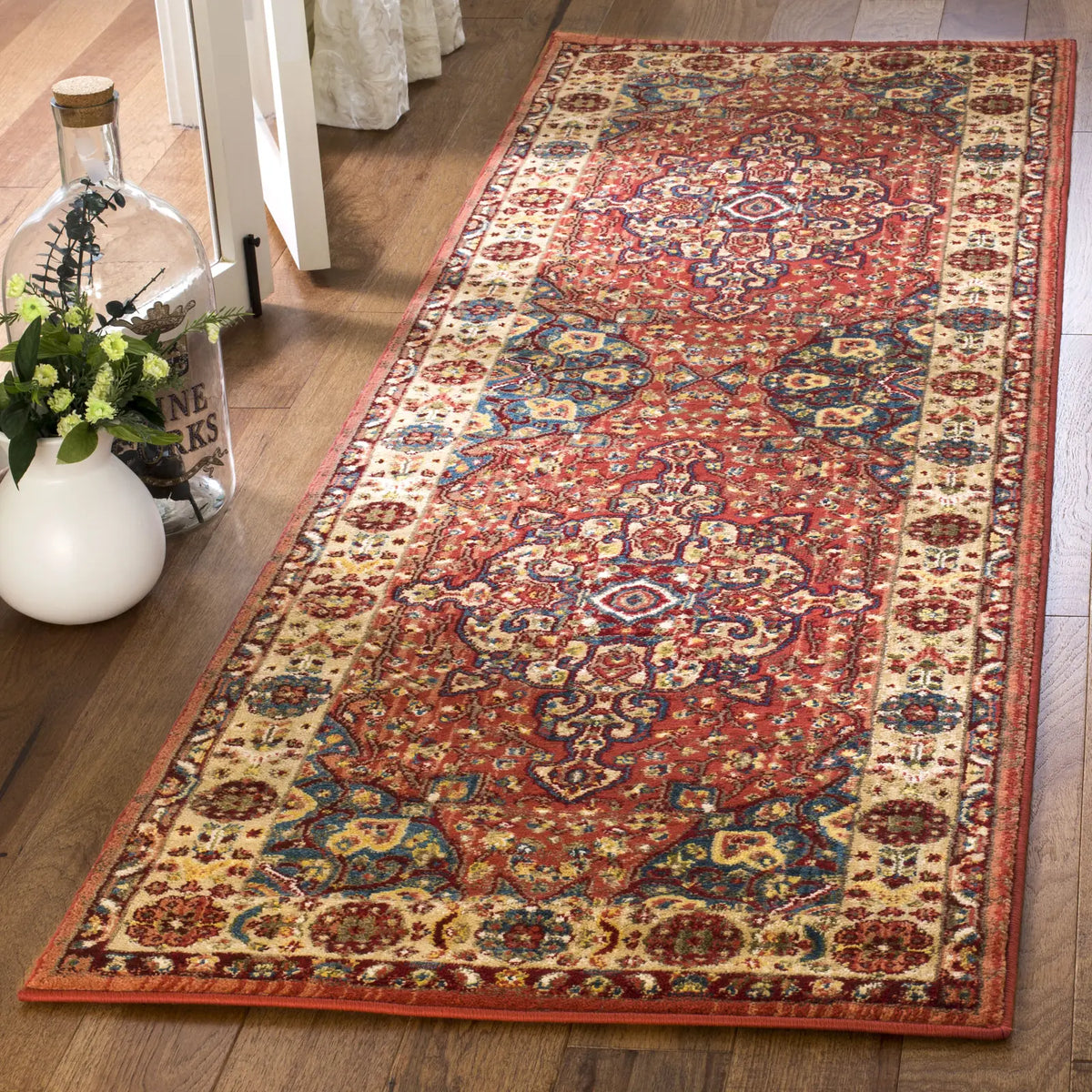 Safavieh Kashan 2'-6" x 10'-0" Rug in Red / Ivory