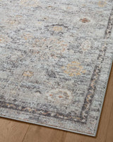 Loloi Monroe Mon-04 Sky/Gold Rug - angled corner on wood