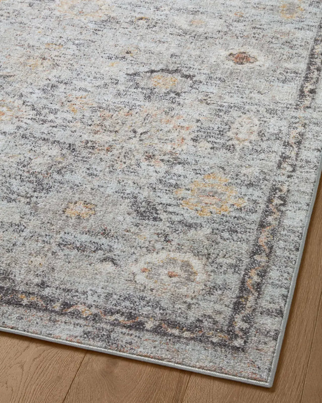 Loloi Monroe Mon-04 Sky/Gold Rug - angled corner on wood