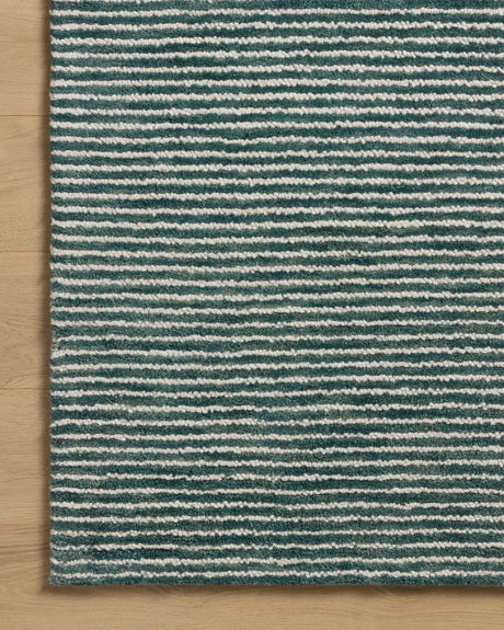 Loloi Sunday SUN-01 Ocean / Ivory Hand Tufted Rug - corner on wood