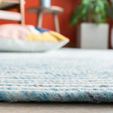 Safavieh Braided 5'-0" x 7'-0" Rug in Blue / Ivory