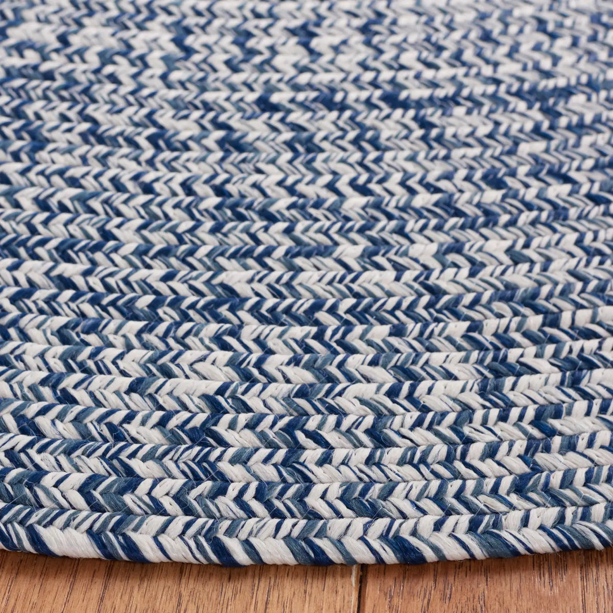 Safavieh Braided 5'-0" x 8'-0" Rug in Dark Blue / Ivory