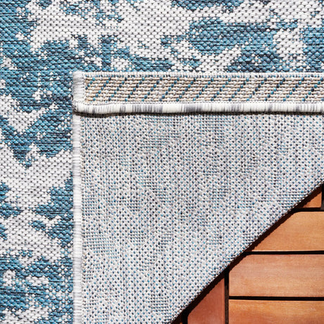 Safavieh Courtyard 5'-3" x 7'-7" Rug in Blue / Grey