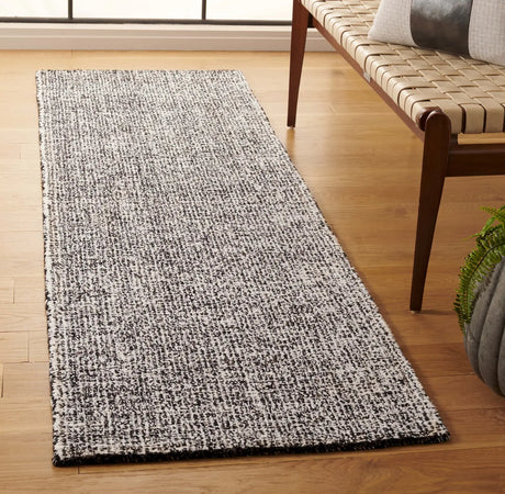 Safavieh Ebony 2'-3" x 7'-0" Rug in Black / Ivory