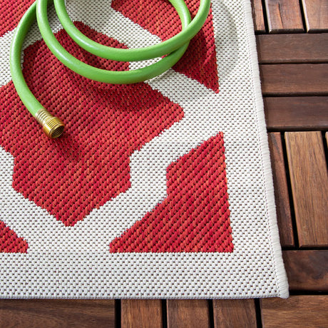 Safavieh Courtyard 5'-3" x 7'-7" Rug in Red / Bone