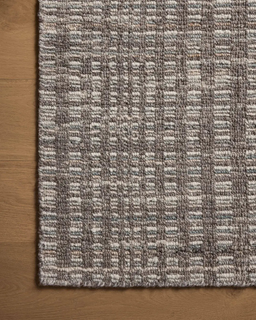 Loloi Sonya Soy-05 Granite/Multi Rug - corner on wood