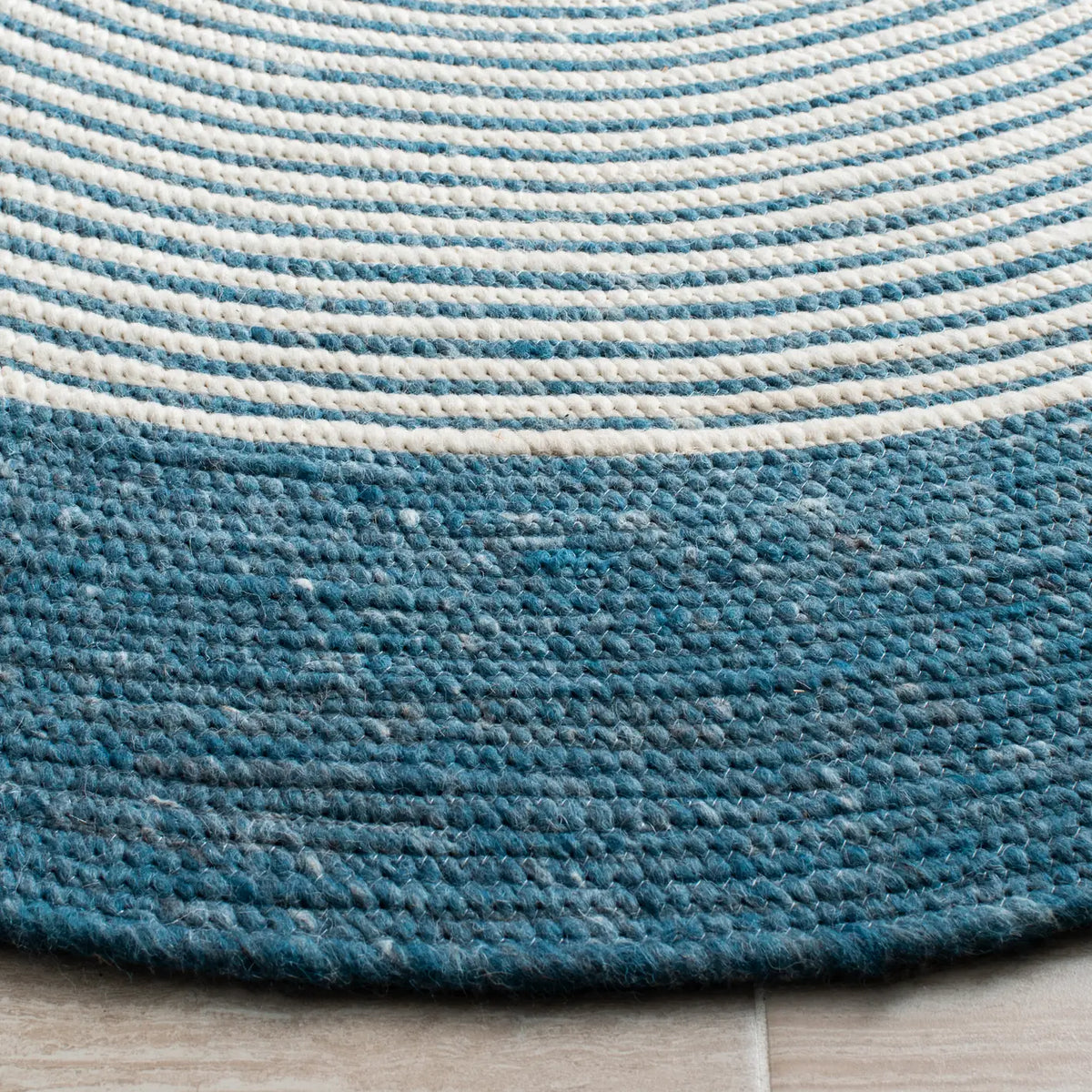 Safavieh Braided 5'-0" x 7'-0" Rug in Teal / Ivory