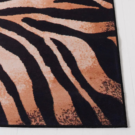 Safavieh Faux Hide 4'-0" x 6'-0" Rug in Light Orange / Black