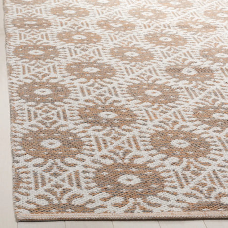 Safavieh Montauk 5'-0" x 8'-0" Rug in Orange / Ivory