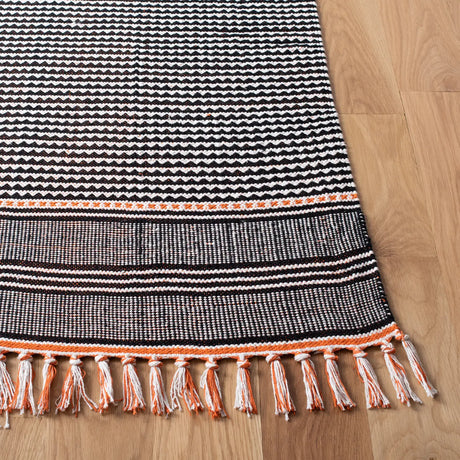 Safavieh Montauk 5'-0" x 8'-0" Rug in Orange / Multi