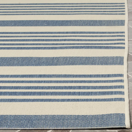 Safavieh Courtyard 5'-3" x 7'-7" Rug in Beige / Blue