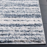 Safavieh Rumi Shag 6'-0" x 9'-0" Rug in Light Blue / Ivory