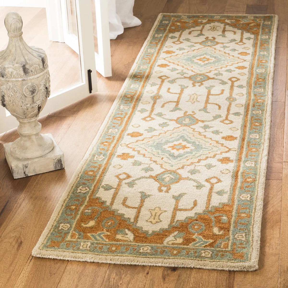 Safavieh Heritage 2'-3" x 10'-0" Rug in Light Blue / Rust