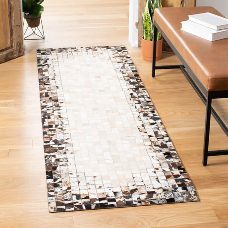 Safavieh Studio Leather 2'-3" x 7'-0" Rug in Beige / Brown