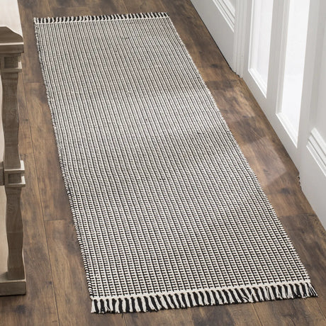 Safavieh Montauk 2'-3" x 10'-0" Rug in Ivory / Black