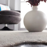Safavieh Faux Cowhide 5'-0" x 6'-5" Rug in Dark Grey / Silver
