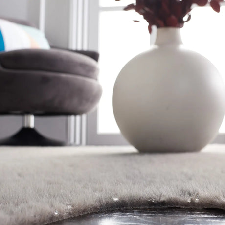 Safavieh Faux Cowhide 5'-0" x 6'-5" Rug in Dark Grey / Silver