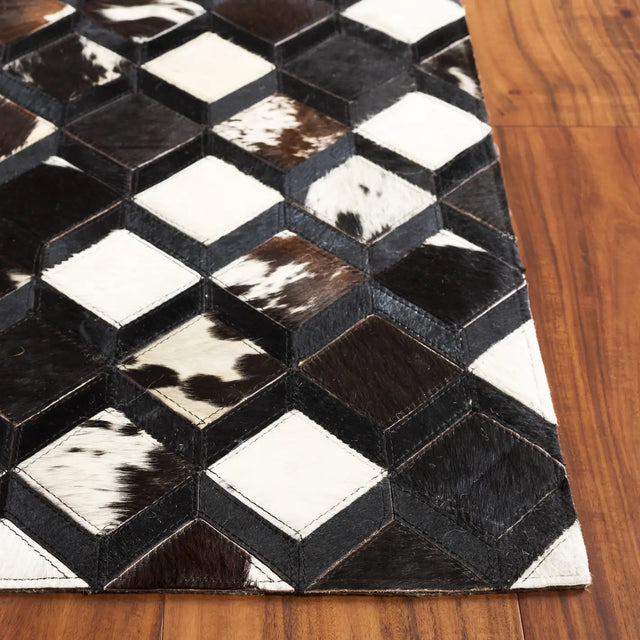 Safavieh Studio Leather 4'-0" x 6'-0" Rug in Black / Ivory