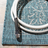 Safavieh Courtyard 6'-7" x 9'-6" Rug in Turquoise