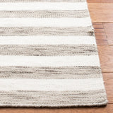 Safavieh Dhurries 4'-0" x 6'-0" Rug in Brown / Ivory