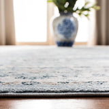 Safavieh Isabella 4'-0" x 6'-0" Rug in Light Blue / Cream