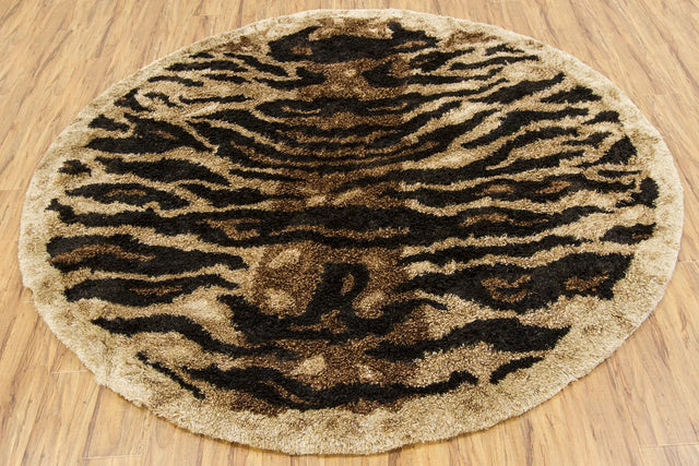 Chandra Amazon AMA-5603 Tan and Gold and Brown and Black round rug, flat view