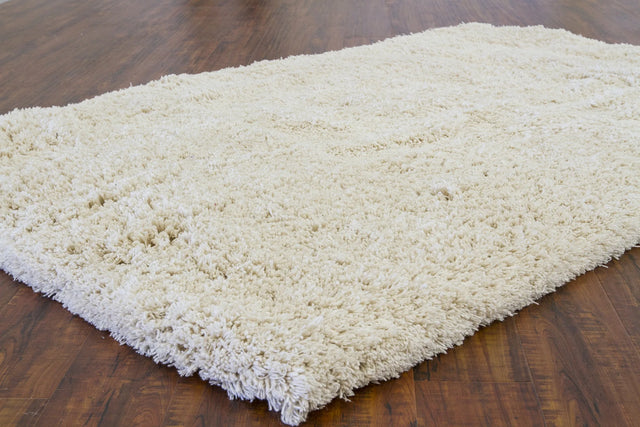 Chandra Ambiance AMB-4200 Ivory rug, styled detail view